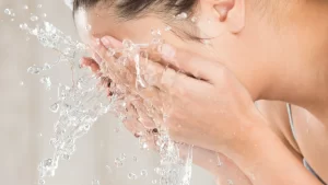 Washing Face With Hot Water
