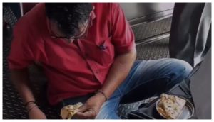 Man Eating Food In Train Video of man eating food sitting on the floor of a train goes viral