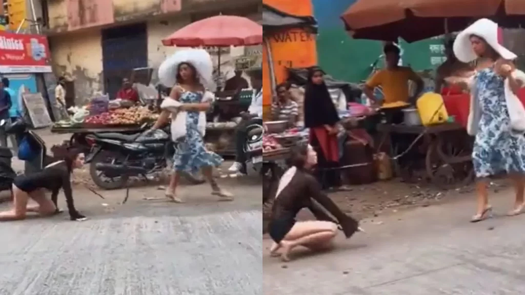 Viral Video woman-walking-with-a-girl-on-the-road-with-a-leash-like-a-dog-in-mumbai-people-shocked trending news in hindi