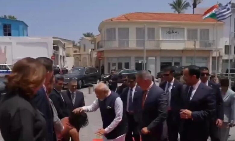 Cyprus leader Mikaela Kitrioti Mlapa touched PM Modi's feet.