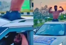 Photo of हाईवे पर सनरूफ स्टंट पड़ा भारी, हापुड़ पुलिस ने युवक पर ठोका भारी भरकम चालान